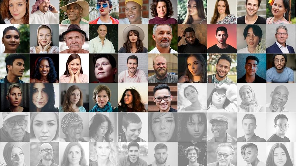 100 small portraits of people's faces with 66 portraits in colour and the rest shaded out in grey.